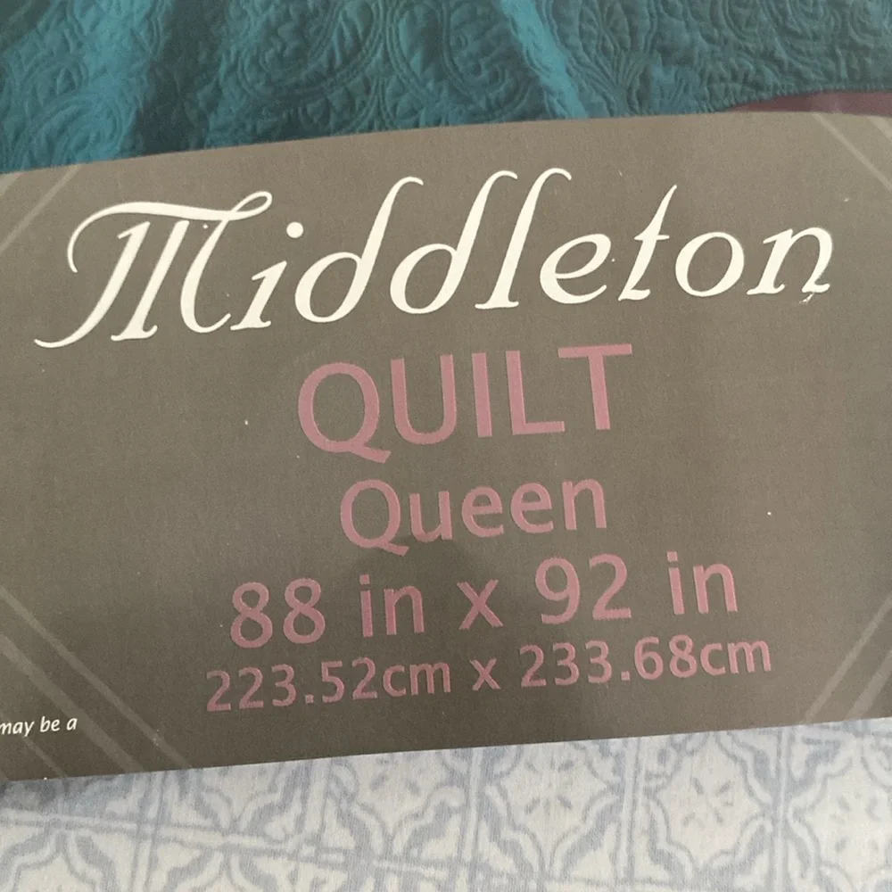 In excellent condition size Queen quilt.